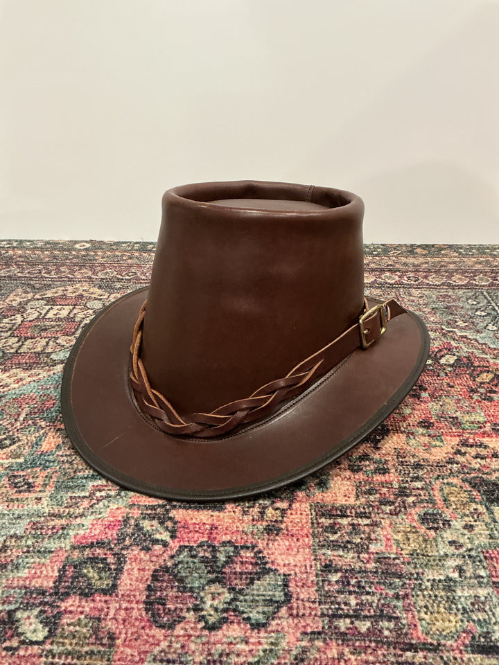 Handmade leather hat with buckle and pin