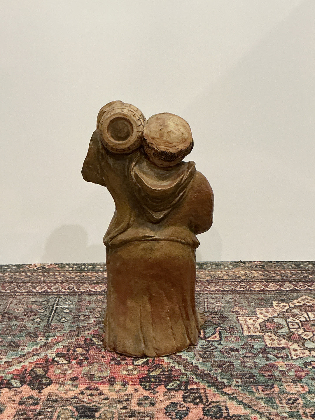 Hand carved drunk monk statue